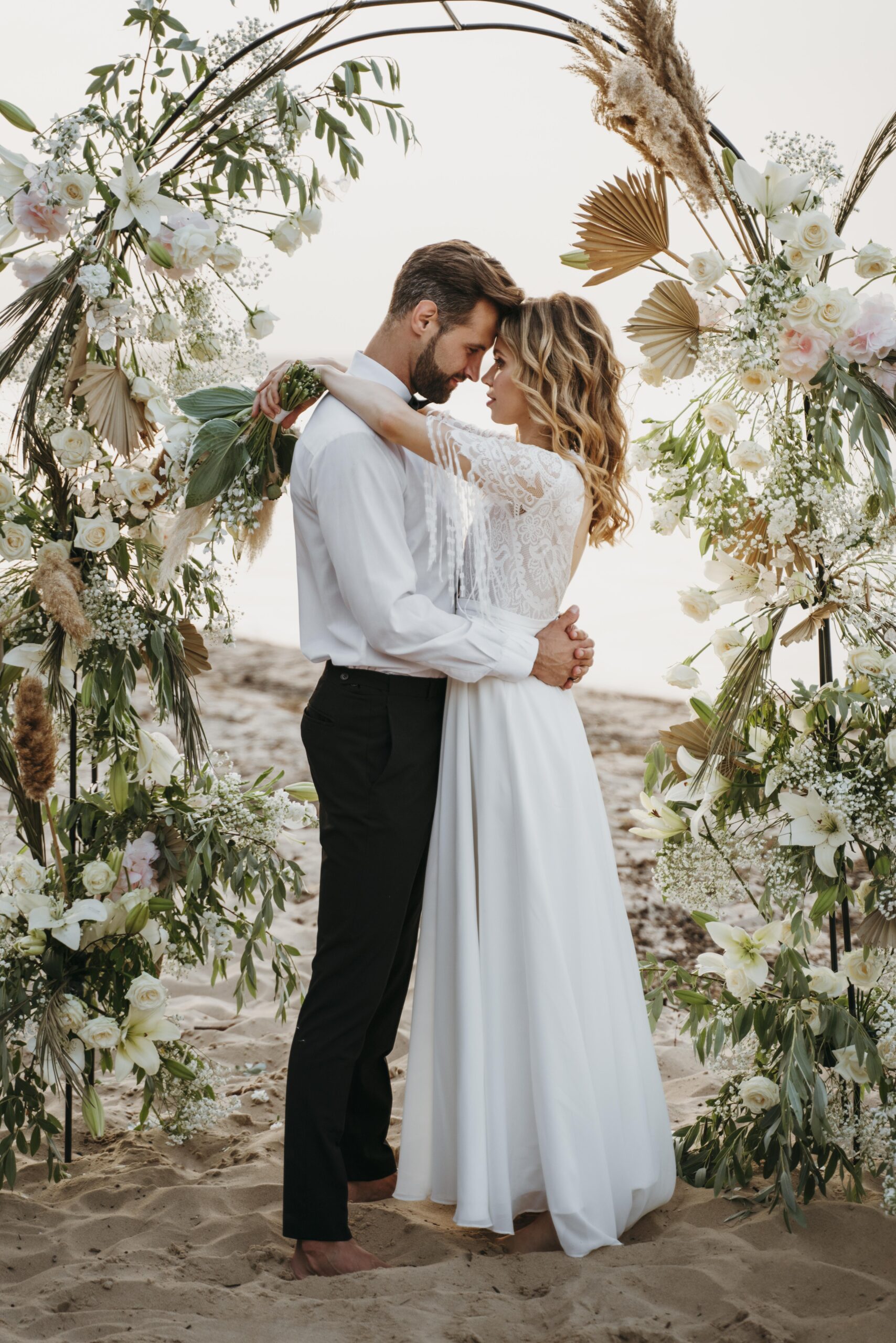 bride-groom-having-their-wedding-beach